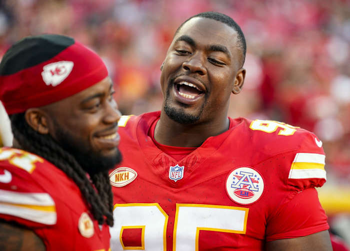 Sep 24, 2023; Kansas City, Missouri, USA; Kansas City Chiefs defensive tackle Chris Jones (95) talks with defensive end Mike Danna (51) during the second half against the Chicago Bears at GEHA Field at Arrowhead Stadium. Mandatory Credit: Jay Biggerstaff-USA TODAY Sports